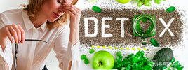 Femme fatiguée près d'aliments verts et du mot « détox », évoquant les signes de fatigue — SANUSq Health