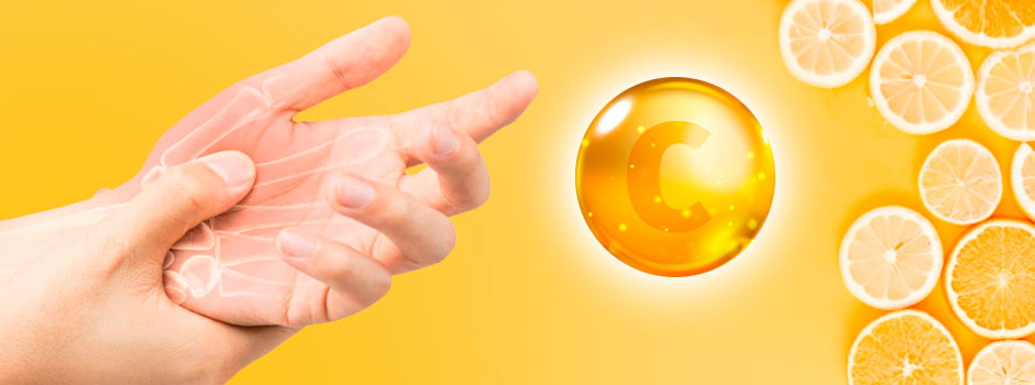 Mains douloureuses près d'une gélule de vitamine C et d'agrumes, évoquant les articulations — SANUSq Health